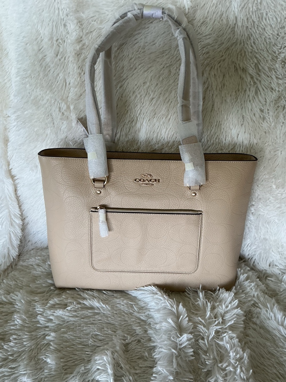 Coach Signature Leather station tote in Oat color